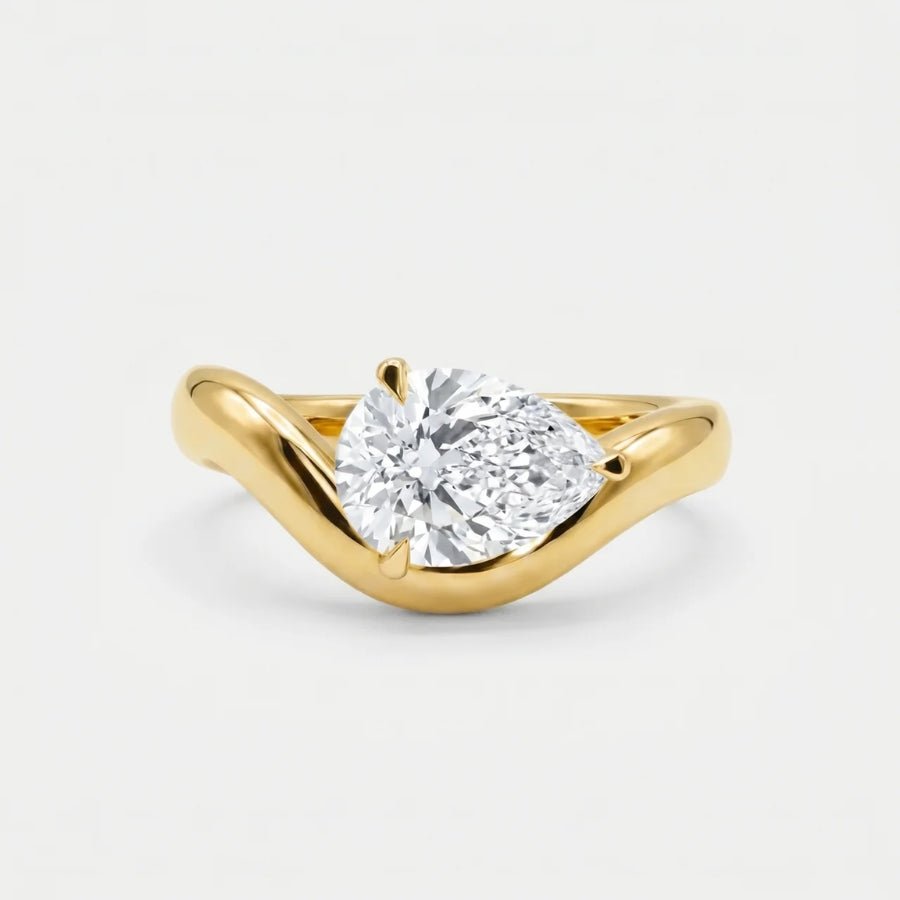 Pear Solitaire Bypass Ring in 18K gold or silver finish